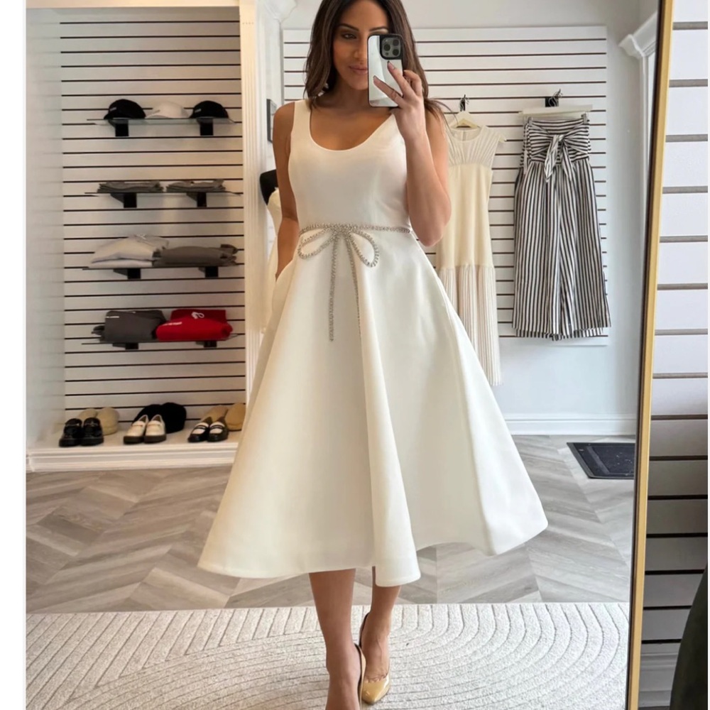 Helsi Helena Sleeveless Crystal Bow Fit &
Flare Midi Dress